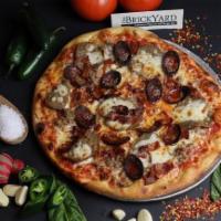 Meat Lovers Pizza · Tomato sauce topped with hand cut pepperoni, crumbled sausage, Applewood smoked bacon, homem...