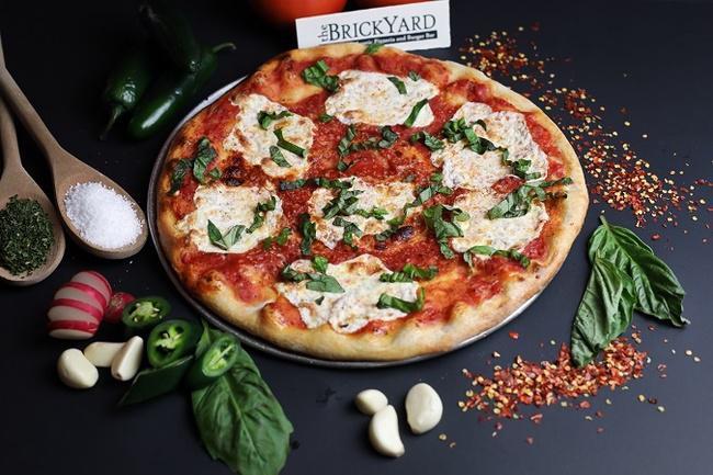 Neopolitan Pizza · Traditional style pizza with tomato sauce, chunks of fresh mozzarella & basil