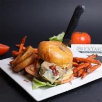 Meatloaf Sandwich · Homemade meatloaf topped with applewood smoked bacon, onion rings, American cheese & brown g...