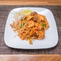 Pad Thai Noodle · Thin flat rice noodle stir fry with tamarind sauce, and egg. Topped with ground peanut, lime...