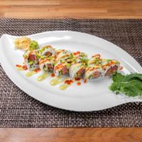 Fuego Roll · In: Salmon, Tuna, Fried Onion, and Jalapeno Out: Wasabi Mayo, Green Onion and Jalapeno
