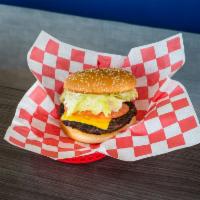 Big Burger · 1/2 lb. pure beef char-grilled burger on a sesame seed bun. Add ons for an additional charge.