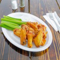 Bone in Naked Wings · Fresh crispy fried jumbo chicken wings tossed in your choice of our sauce list