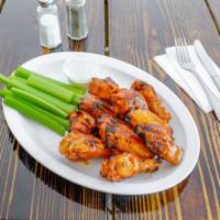 Char Grilled Wings · Fresh char-grilled jumbo chicken wings tossed in your choice of our sauce list