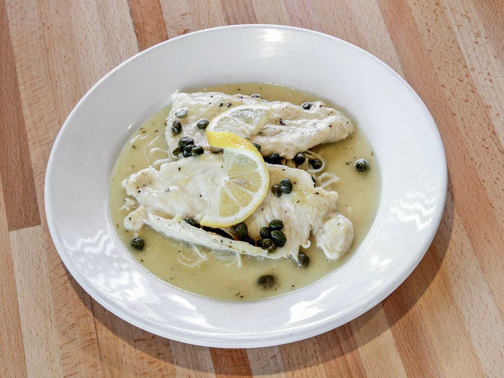 Chicken Piccata · Sauteed chicken breast with butter, lemon capers, white sauce over pasta.