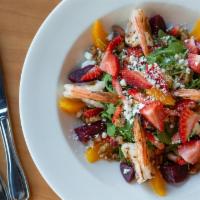 Arugula Salad* · Fresh strawberries, roasted beets, oranges, goat cheese, candied walnuts all tossed with our...