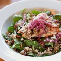 Wild Salmon Spinach Salad* · Grilled and sustainable Coho salmon on top of spinach salad mixed with grilled pears, candie...