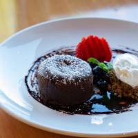 Molten Chocolate Cake · This dessert is a chocolate explosion! Served warm with a blast of chocolate melted inside, ...