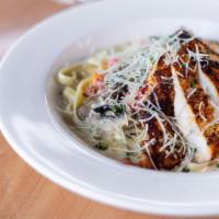 Blackened Chicken Alfredo · Our amazing Alfredo sauce with mushrooms, roasted peppers and parmesan cheese tossed with fe...