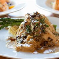 Chicken Marsala · Draper valley chicken breast, cooked with Marsala wine sauce and gourmet mushrooms, served w...