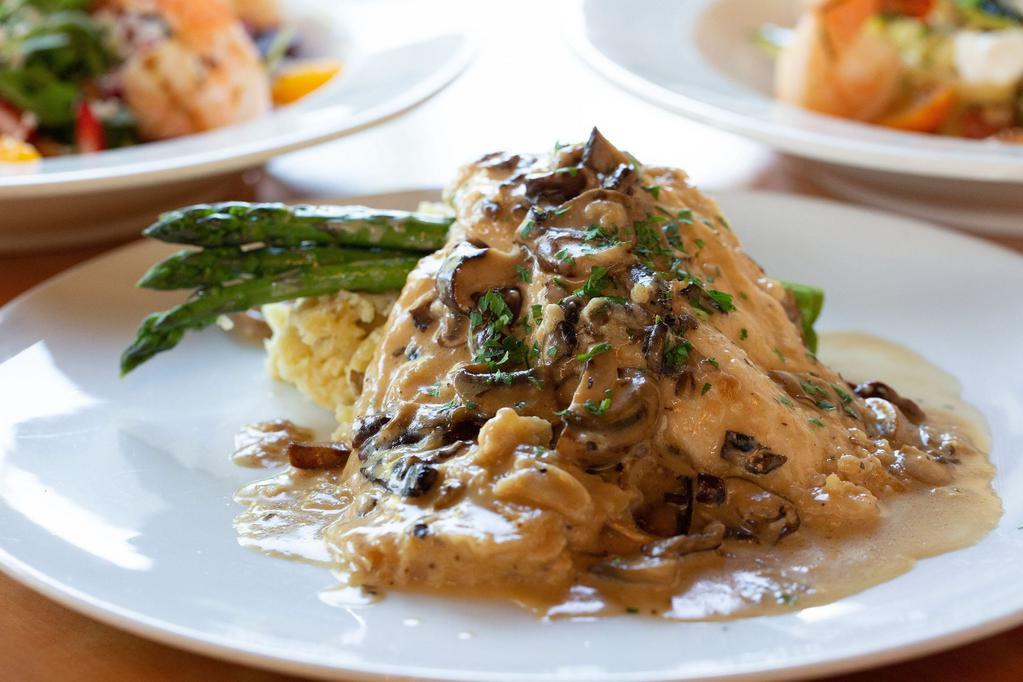 Chicken Marsala · Draper valley chicken breast, cooked with Marsala wine sauce and gourmet mushrooms, served with mashed potatoes and asparagus.