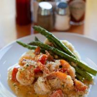 Shrimp Scampi · This dish is fantastic! It is sautéed prawns with tomatoes, garlic butter sauce, grilled asp...