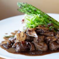 Steak Tips Cabernet · Shoulder steak tenderloin cooked with cippolini onions, mushrooms in a red wine demi glaze s...