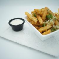 Truffle Fries · Fried to a golden brown crisp, tossed with grated Parmesan cheese, salt and chopped fresh pa...