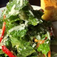 Entrée Caesar Salad · Fresh Romain, cornbread croutons, and julian red peppers, all tossed in our house made Cesar...