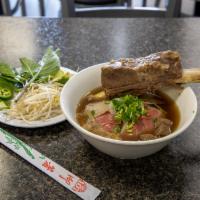 P1. Yummy Pho · Beef noodle soup, short rib, eye round steak, meatball, well done flank, brisket and soft te...