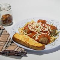 Spaghetti Dinner with 5 Meatballs · Served with salad and garlic bread.