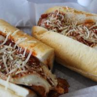 Meatball Parmigiana Sandwich · Served with homemade sauce, provolone and Parmesan cheeses.