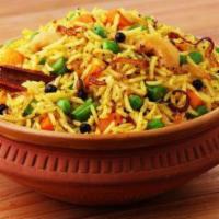 Vegetable Dum Biryani · Basmati rice cooked with fresh vegetables and very rich organic Indian spices.