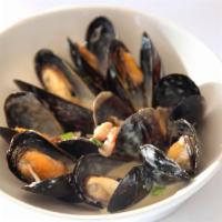 Pancetta Mussels · Prince Edward Island Mussels sauteed with fennel, shallots and pancetta in a white wine crea...