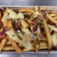 Pile of Fries · Natural-cut fries, gouda cheese sauce, bacon, chives.