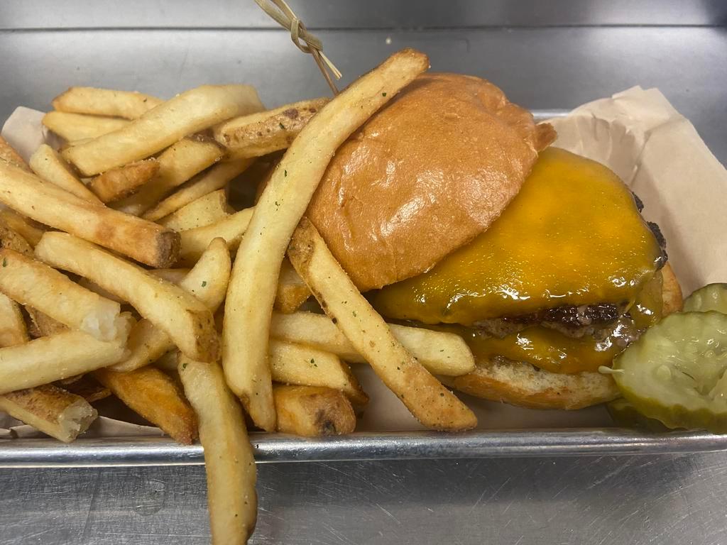 Cheeseburger · Served on a butter grilled bun with truffle mayo. 2 patties with cheddar cheese.