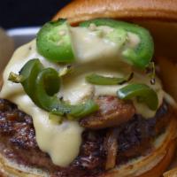 The Combine Burger · Beef patty, pastrami, caramelized onion, charred  jalapeno, peeper jack cheese, avenger IPA ...