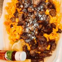 Skirt Steak Esquite · Toasted Corn in Butter mixed with mayo, Cotija cheese & Skirt Steak Chunks. Served with Corn...