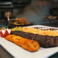 Carne Asada  · Grilled SKIRT STEAK. Served with rice, beans and tortillas or salad and french fries.