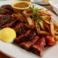 Bistecca e Fritte · Argentina. Grilled hanger steak and herbed country fries served with chimichurri sauce.