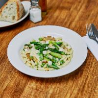 Cavatelli ai Vegetali con Scamorza · Abruzzi. Homemade short pasta with asparagus, cremini mushrooms and fava beans in garlic and...