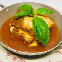 Lasagne Marchigiane · Marche. Lasagna with béchamel, Bolognese sauce and Parmigiano cheese.