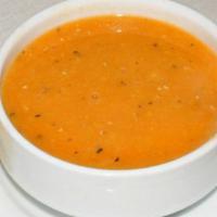 Red Lentil Soup · Subtle and exquisite flavors. Served with pita bread.