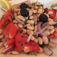 Piyaz Salad · Turkish white beans, Bermuda onions, parsley and tomatoes tossed with house dressings. Serve...