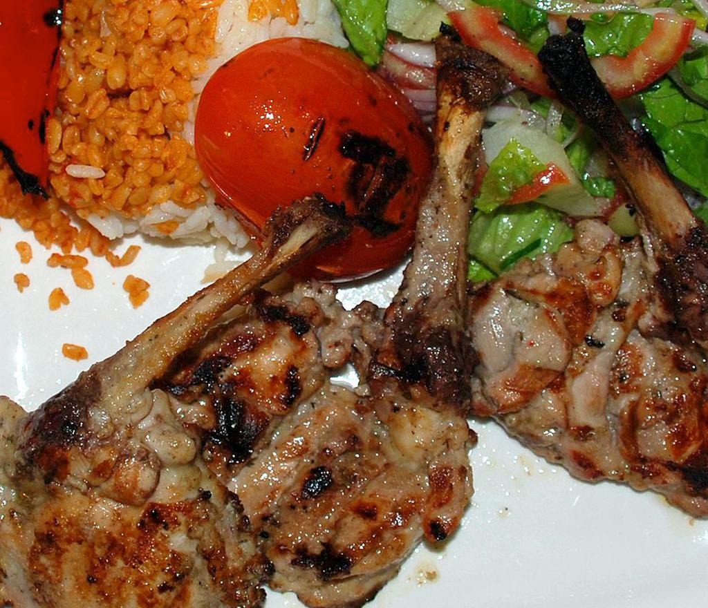 Chicken Chops · Char grilled tender chicken drums served with rice and salad. 
