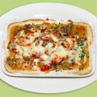 Shrimp Casserole · A casserole of delicious baked shrimp, mushrooms, peppers, and tomatoes topped with kasar ch...