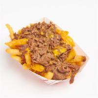 Cheesesteak Fries · Crispy fries smothered in rib-eye steak and cheese wiz.