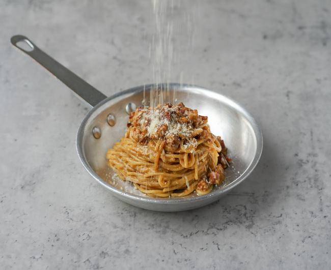 Spaghetti Carbonara · Traditional carbonara pasta with eggs, pancetta (bacon), and parmesan cheese.