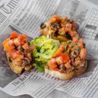 Bruschetta · Fresh bread toasted and served with diced tomatoes, basil, olive oil, and olives. Three piec...