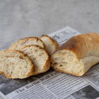 Extra Bread · Two slices of our freshly baked bread. Perfect for dipping in soup or sauce.