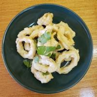 A9. Calamari Rings · Crispy lightly battered calamari rings; serves with special sauce.