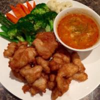 Z3. Curry Crispy Chicken · Crispy chicken served with panang sauce on the side, steamed broccoli, zucchini, green beans...