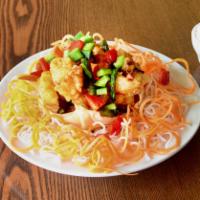 32. Crispy Seafood Lover · Battered and deep-fried shrimp, scallop, squid and string beans tossed in a sticky chili gar...