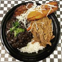 Pabellon Bowl · Our signature shredded beef, black beans and sweet plantains on a bed of white rice