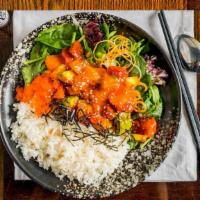 Poke · Tomato, salmon, avocado, masago and salad mixed with special spicy sauce over rice.