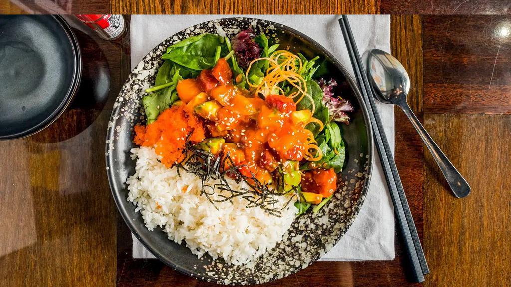 Poke · Tomato, salmon, avocado, masago and salad mixed with special spicy sauce over rice.