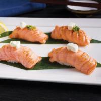 Aburi Salmon Sushi Set · Torched salmon with think sliced onion and special suace, torched salmon with cream cheese, ...