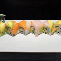 Rainbow Roll · California roll with fluke, yellowtail, tuna, salmon, white fish wrapped on top.