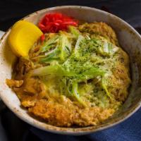 Katsu Don · Fried pork or chicken cutlet with sauce over rice.