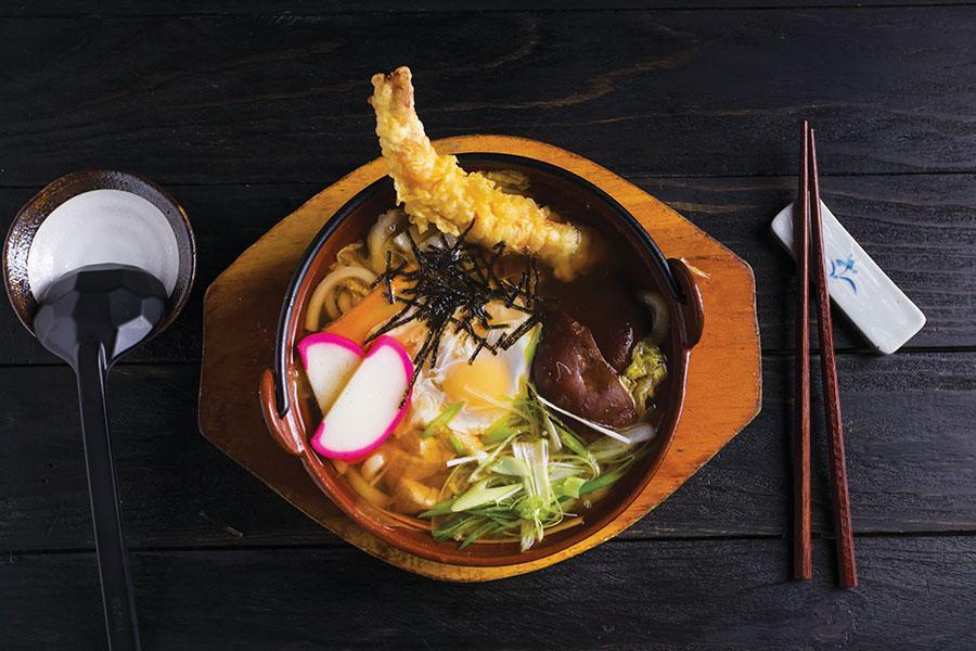 Nabe Yaki Udon · Hot pot noodle soup w/ assorted vegetables, chicken, and shrimp tempura.